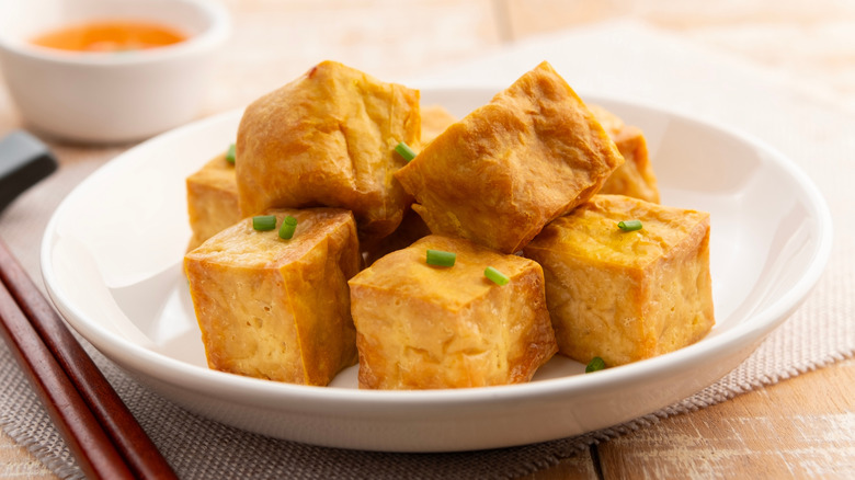 Bowl of cubed crispy fried tofu