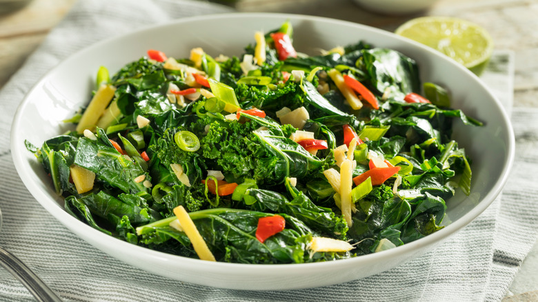 Bowl of collard greens with other veggies mixed in