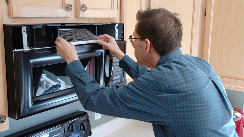 Microwave grease filter removal