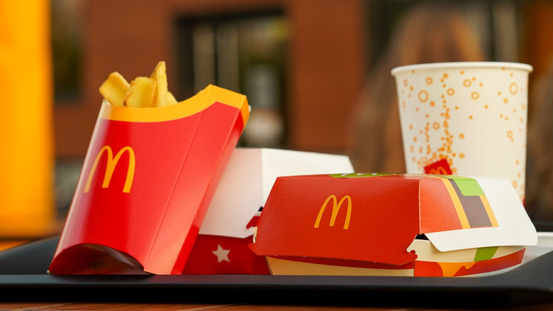 A McDonald's meal sitting on a table outside