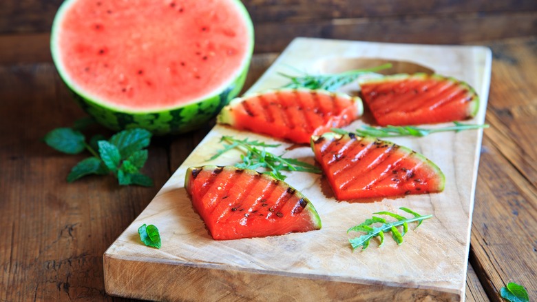 grilled watermelon on cutting board