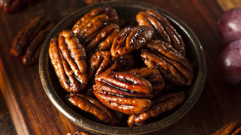 Small bowl of candied pecans