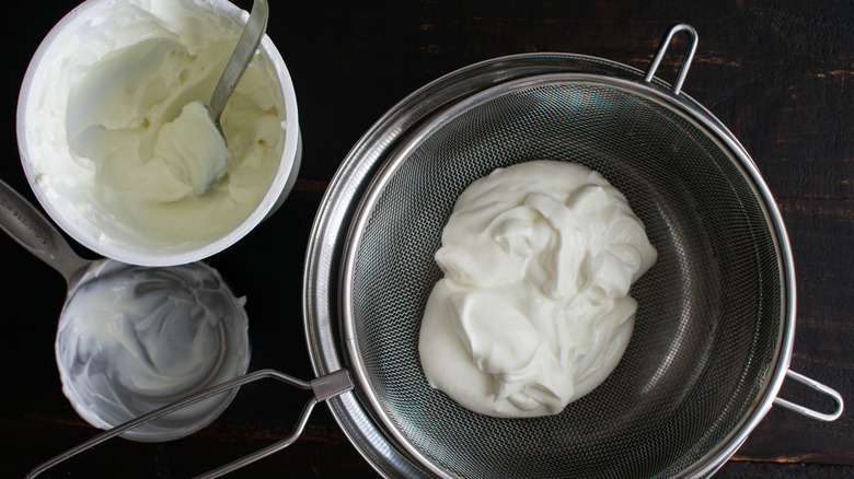 yogurt draining in a sieve