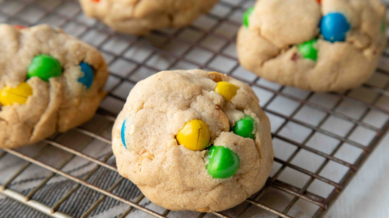 M&M's cookies on a wire rack