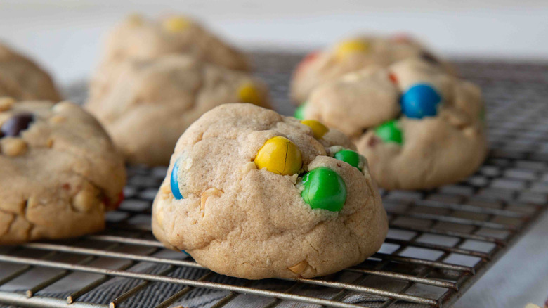 M&M's cookies on a wire rack