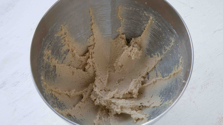 beige batter in a metal bowl