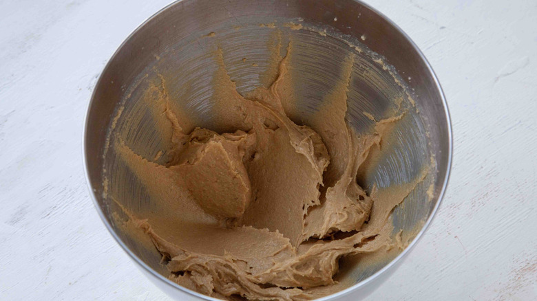 beige batter in a metal bowl