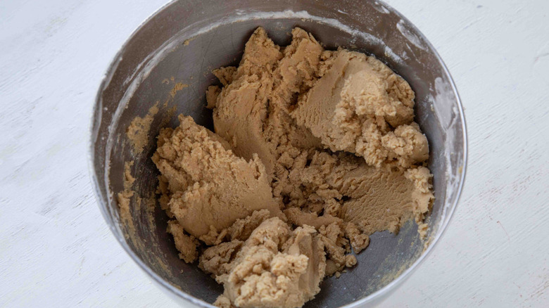 beige batter in a metal bowl