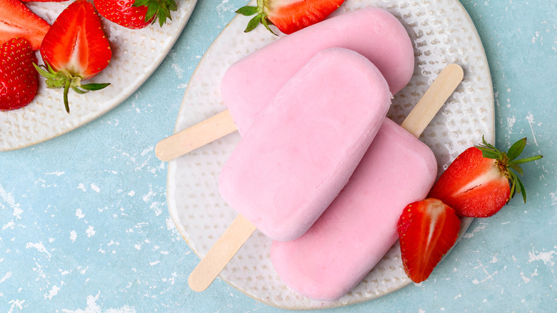 Homemade strawberry ice pops with fresh strawberries