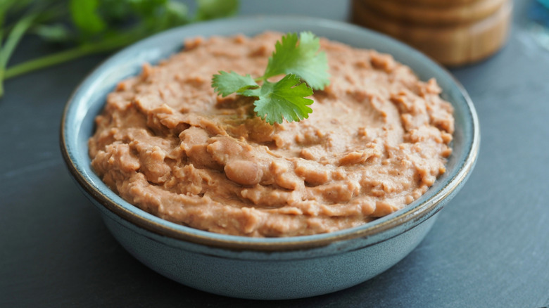 refried beans in a blue bowl
