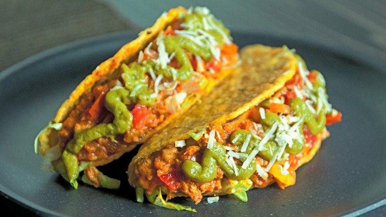 hard shell beef tacos on plate