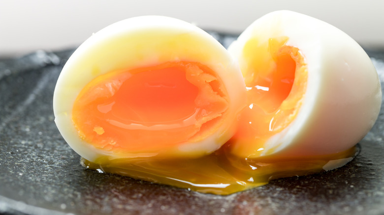 halved soft-boiled egg on a plate