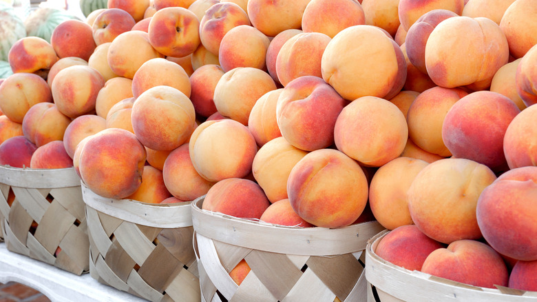 Several peaches viewed from above.