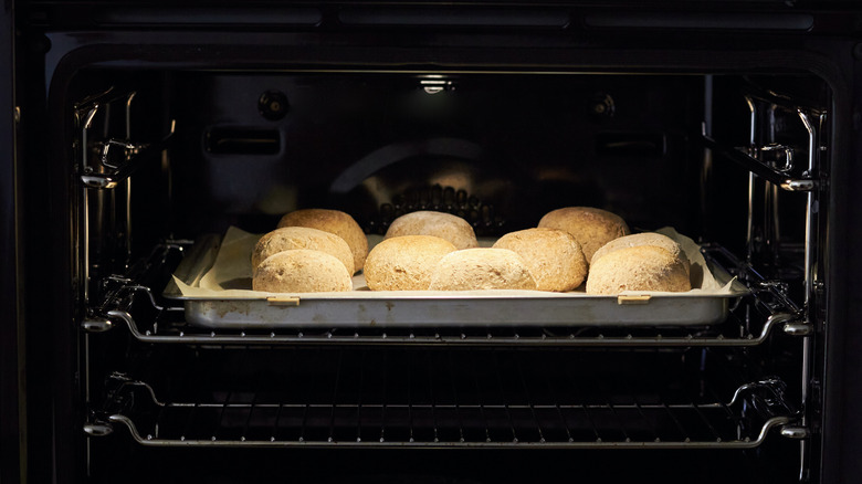 Dinner rolls in a black oven