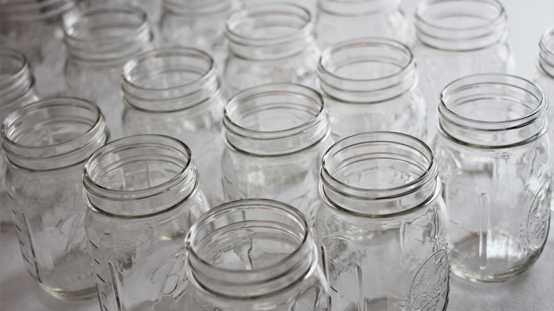 Empty mason jars in rows