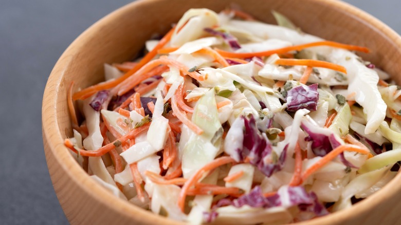 Coleslaw in wood bowl up close