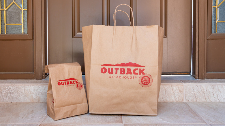 Takeout bags from Outback Steakhouse