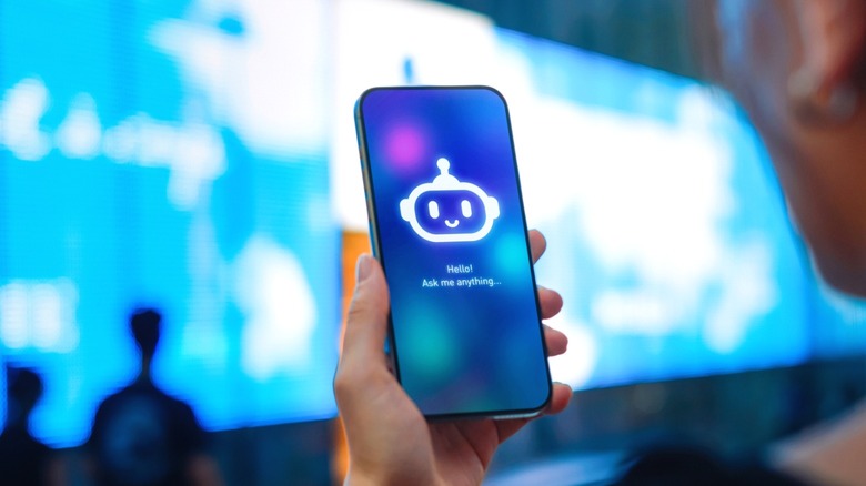 A woman consulting with a chatbot on her phone.