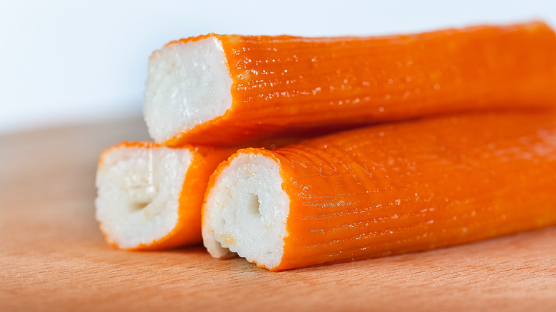 surimi sticks on wood board