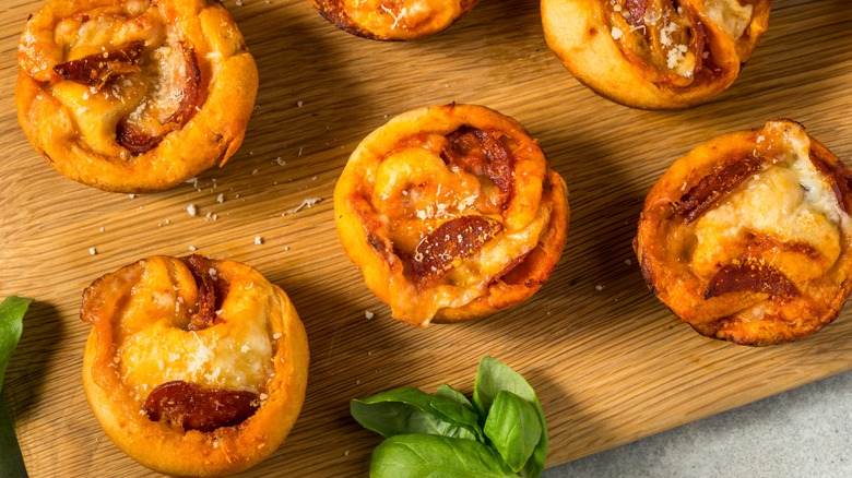 Pizza muffins made from leftover pizza crust