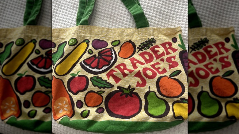 A Trader Joe's iconic fruits and vegetables canvas bag