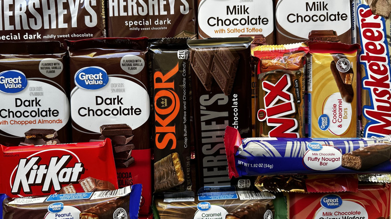 assortment of Great Value chocolate bars and name brand chocolate bars