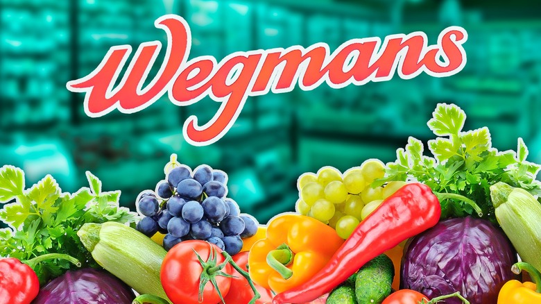 Fruits and vegetable produce with a green background and Wegmans logo
