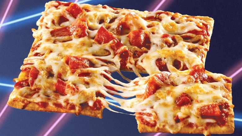 Subway's Flatizza isolated on stylized background, one slice removed to show a cheese pull