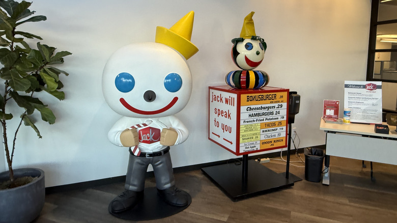 lobby area of Jack in the Box with statue of the chain's businessman clown mascot