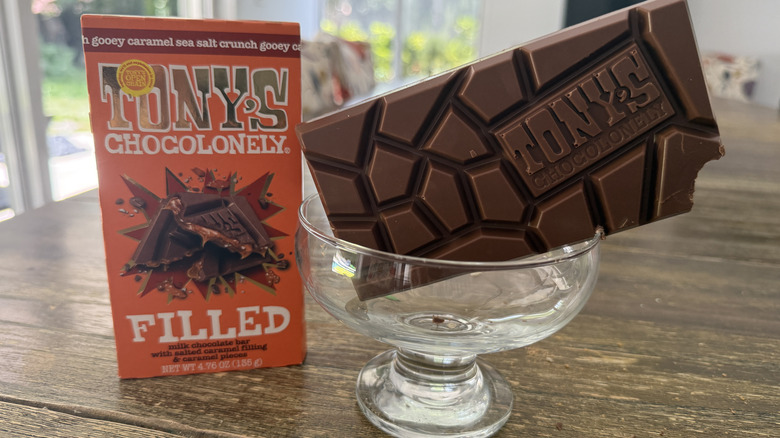 Tony's filled chocolate bar in glass bowl on wooden table