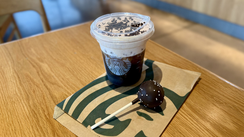 White Chocolate Strawberry Cream Cold Brew with a Chocolate Cake Pop