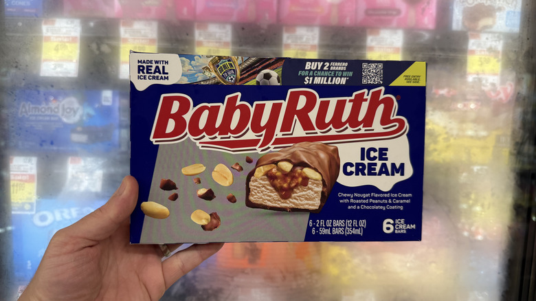 Hand holding a box of Baby Ruth Ice Cream Bars