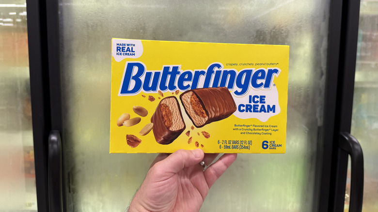Hand holding a box of Butterfinger Ice Cream Bars