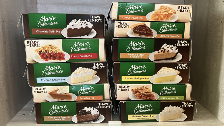 Two stacks of Marie Callendar's frozen pie boxes in 11 varieties