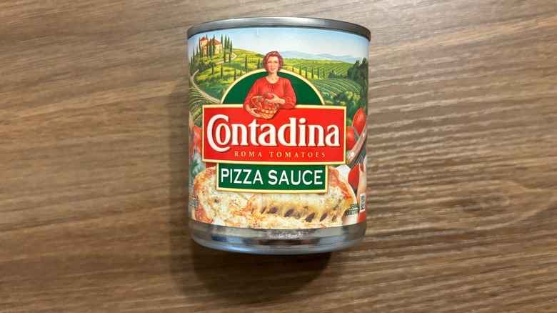 Contadina Roma Tomatoes Pizza Sauce can on wooden table