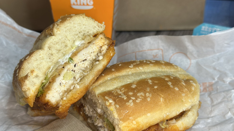 Burger King Spicy Original Chicken sandwich cut in half on wax wrapper
