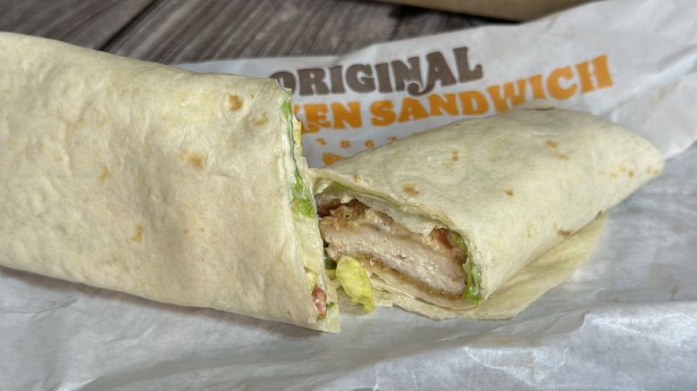 Burger King Classic Flame-Grilled Chicken Wrap cut in half on wrapper