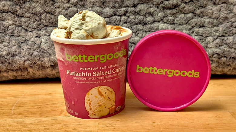 A pint of Walmart's Bettergoods brand Pistachio Salted Caramel flavored premium ice cream