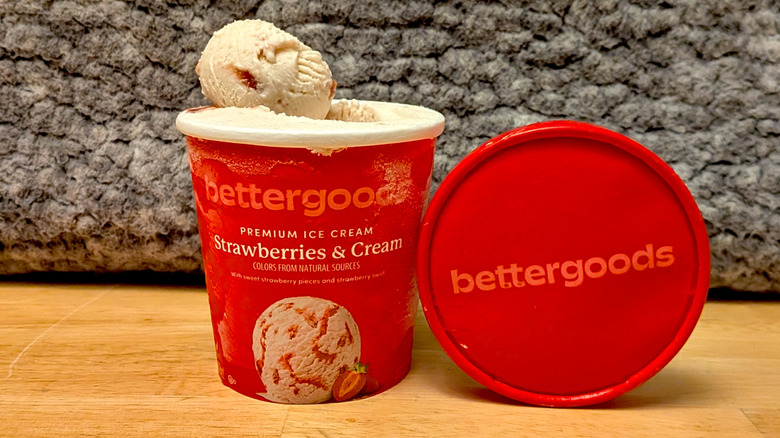 A pint of Walmart's Bettergoods brand Strawberries & Cream flavored premium ice cream