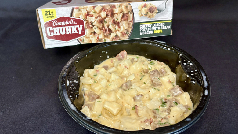 Chunky Cheesy Loaded Potato with Steak and Bacon frozen bowl microwave meal with box behind