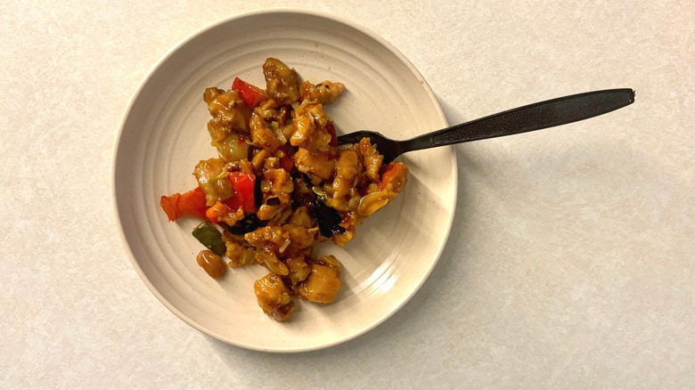 Kung Pao Chicken on plate with fork