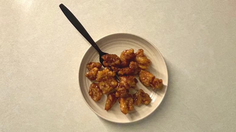 Panda Express Orange Chicken on plate with fork
