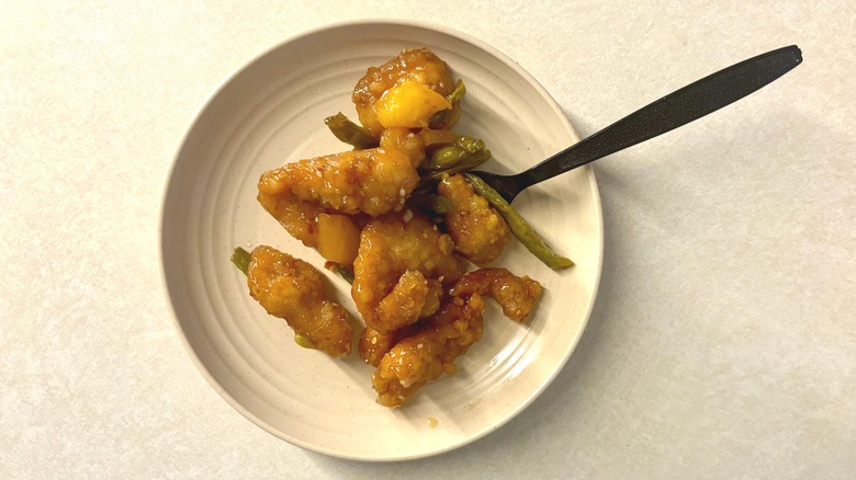 Panda Express Honey Sesame Chicken Breast on plate with fork