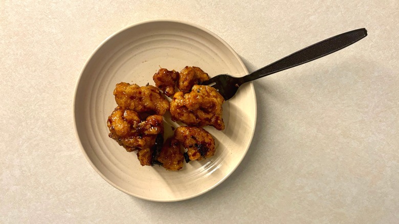 Panda Express Hot Orange Chicken on plate with fork