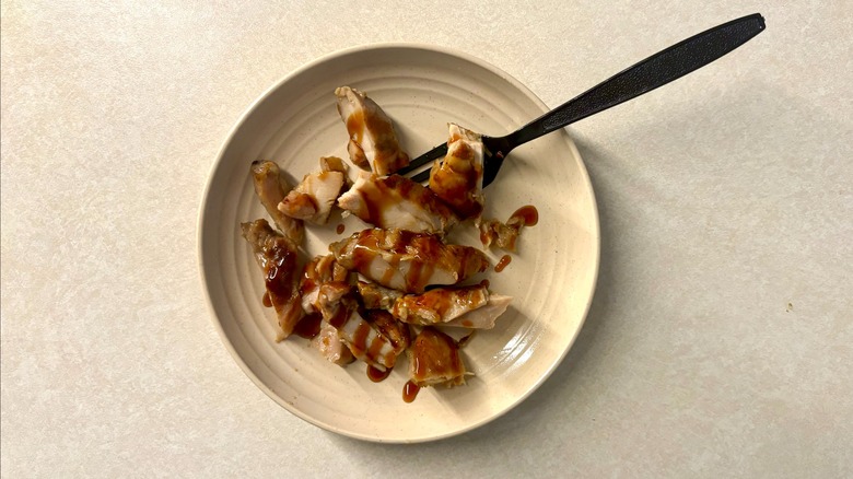 Panda Express Teriyaki Chicken on plate with fork