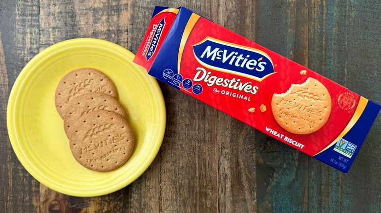 A plate of McVitie's original digestive biscuits next to the package