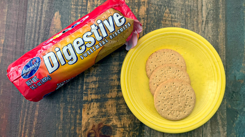 A plate of Burton's sweetmeal digestive biscuits next to the package
