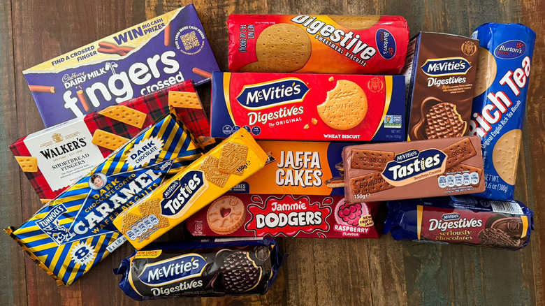 13 packs of iconic British biscuits on a table