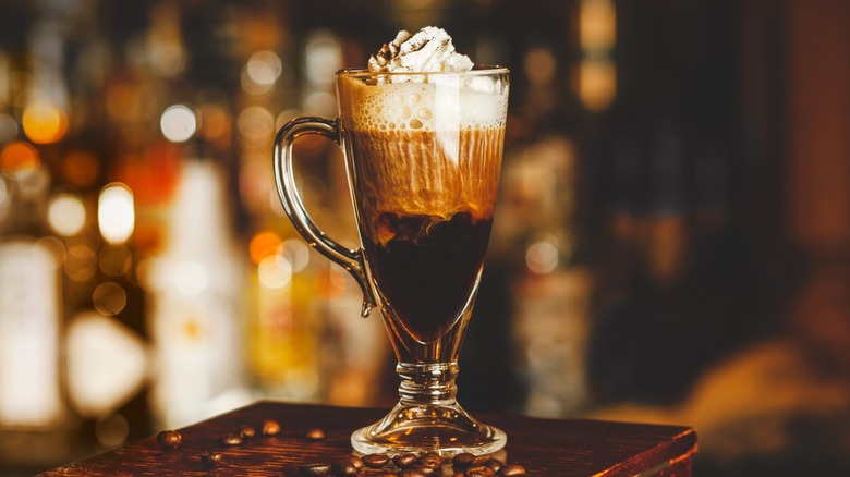 Irish coffee on wood counter in bar
