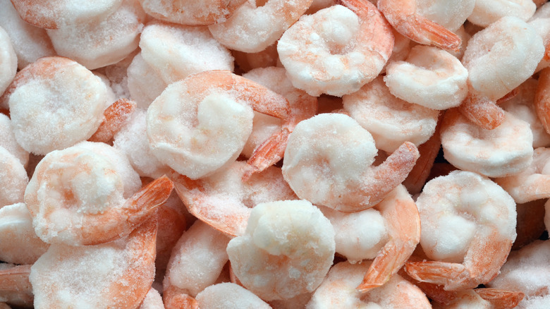 Pieces of frozen shrimp